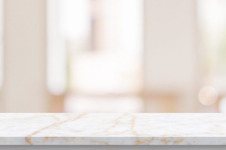 table top with blurred kitchen cafe restaurant interior background